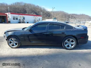 2014 Dodge Charger RT 100th Anniversary with VIN 2C3CDXCT4EH261977, listed as a IAAI auction lot 41815504 with 92,478 mi miles. Bid and sale history available at carsss.com. Image 15.