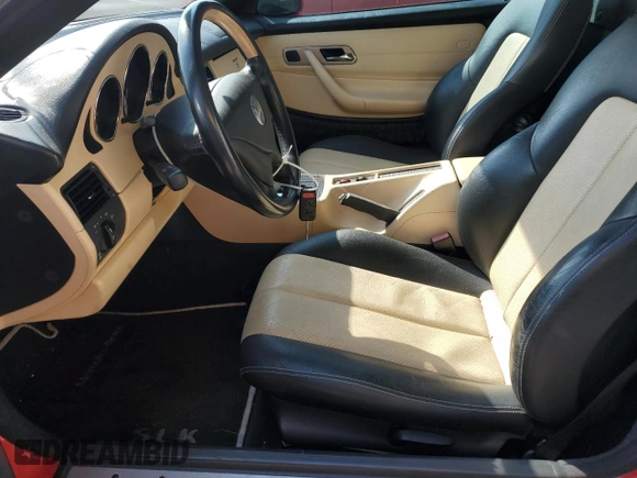 2003 Mercedes-Benz SLK 230 Kompressor with VIN WDBKK49F93F278588, listed as a Copart auction lot 58633785 with 82,409 mi miles and Salvage title. Bid and sale history available at DreamBid. Image 7.