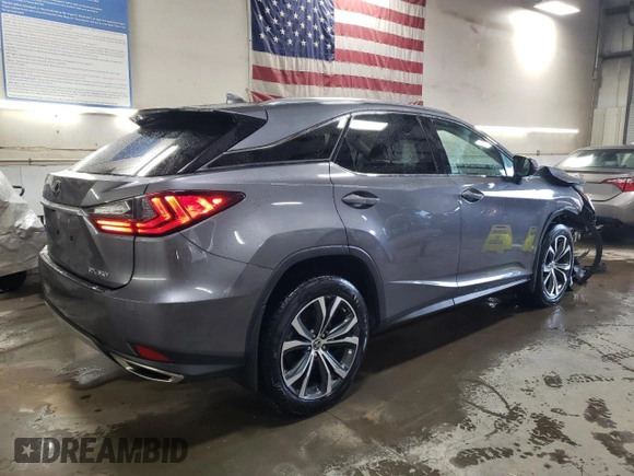 2021 Lexus RX with VIN 2T2HZMDAXMC307489, listed as a Copart auction lot 52098545 with 53,695 mi miles and Salvage Title. Bid and sale history available at carsss.com. Image 3.