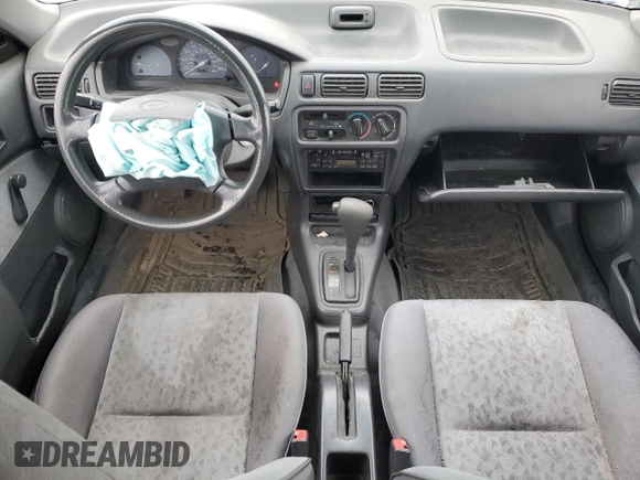 1998 Toyota Tercel z VIN JT2BC53LXW0335979, wystawiony jako Copart lot #46542655 z przebiegiem 275 340 mil mil oraz Nie do naprawy • Non repairable. Historia ofert i sprzedaży dostępna na DreamBid. Obrazek 8.