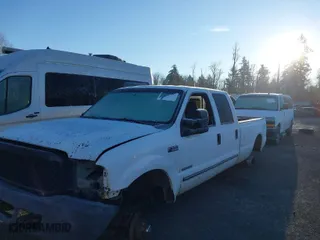 1999 Ford Super Duty F-350 SRW XL with VIN 1FTSW31F0XEE53396, listed as a IAAI auction lot 41383093 with 307,697 mi miles. Bid and sale history available at carsss.com. Image 2.