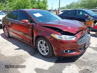 2016 Ford Fusion SE Hybrid z VIN 3FA6P0LU3GR143688, wystawiony jako IAAI lot #42269789 z przebiegiem 163 910 mil mil oraz . Historia ofert i sprzedaży dostępna na DreamBid. Obrazek 1.