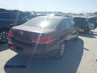 2007 Toyota Avalon XL z VIN 4T1BK36B97U205988, wystawiony jako IAAI lot #41738847 z przebiegiem 99 951 mil mil oraz . Historia ofert i sprzedaży dostępna na DreamBid. Obrazek 4.