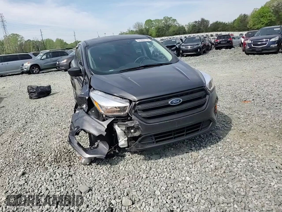 2017 Ford Escape S with VIN 1FMCU0F79HUB36083, listed as a Copart auction lot 51093174 with 59,928 mi miles and Salvage title. Bid and sale history available at DreamBid. Image 12.
