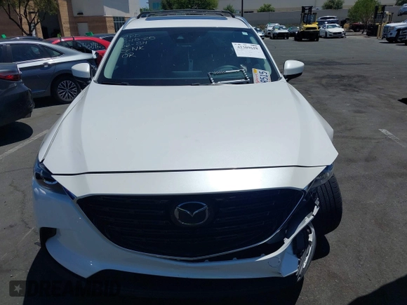 2023 Mazda CX-9 Touring Plus with VIN JM3TCBAY7P0636047, listed as a IAAI auction lot 42309618 with 20,821 mi miles and . Bid and sale history available at DreamBid. Image 12.