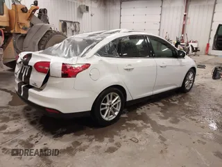 2015 Ford Focus SE with VIN 1FADP3F26FL253926, listed as a IAAI auction lot 41947476 with 86,254 mi miles and . Bid and sale history available at carsss.com. Image 4.