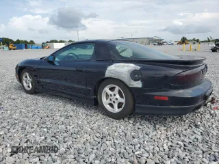 1998 Pontiac Firebird Firebird z VIN 2G2FS22K2W2216667, wystawiony jako Copart lot #63143015 z przebiegiem 107 097 mil mil oraz Szkoda całkowita • Salvage title. Historia ofert i sprzedaży dostępna na DreamBid. Obrazek 2.