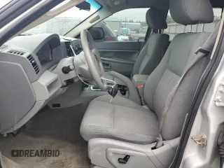 2005 Jeep Grand Cherokee Laredo with VIN 1J4GR48K55C719634, listed as a Copart auction lot 61809195 with 141,316 mi miles and Salvage title. Bid and sale history available at DreamBid. Image 7.