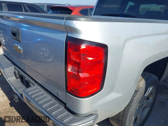 2015 Chevrolet Silverado 1500 LT with VIN 3GCPCREH0FG152809, listed as a IAAI auction lot 41573835 with 213,410 mi miles and . Bid and sale history available at DreamBid. Image 6.