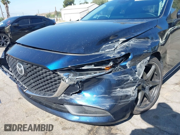 2021 Mazda 3 S with VIN JM1BPAALXM1326956, listed as a IAAI auction lot 42304248 with 55,104 mi miles and . Bid and sale history available at DreamBid. Image 12.