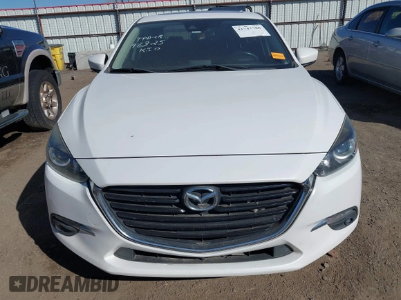 2017 Mazda 3 Grand Touring z VIN 3MZBN1W34HM139393, wystawiony jako IAAI lot #41747788 z przebiegiem 137 275 mil mil oraz . Historia ofert i sprzedaży dostępna na DreamBid. Obrazek 12.