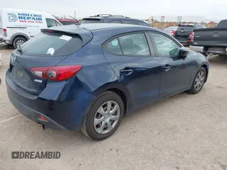 2015 Mazda 3 i Sport with VIN 3MZBM1K72FM158887, listed as a IAAI auction lot 41449026 with 121,393 mi miles and . Bid and sale history available at DreamBid. Image 4.