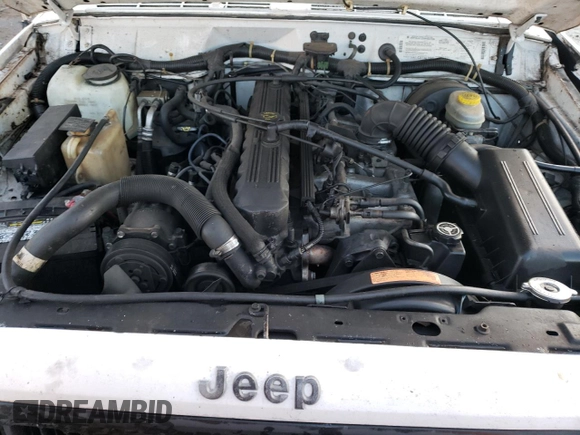1995 Jeep Cherokee SE с VIN 1J4FT28S1SL634660, выставлен на аукционе Copart как лот 41530075 с пробегом Не указан миль и Списание • Salvage title. История ставок и продаж доступна на DreamBid. Изображение 14.