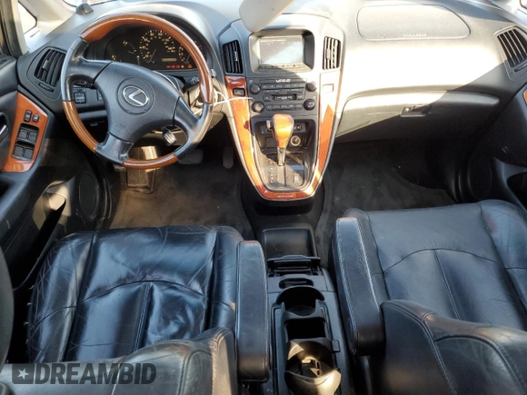 2002 Lexus RX 300 with VIN JTJHF10UX20277815, listed as a Copart auction lot 73397284 with 214,627 mi miles and Salvage Title. Bid and sale history available at carsss.com. Image 8.