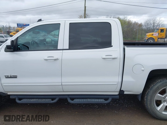 2016 Chevrolet Silverado 1500 LT with VIN 3GCUKREC0GG136136, listed as a IAAI auction lot 41971199 with 179,045 mi miles and . Bid and sale history available at DreamBid. Image 14.
