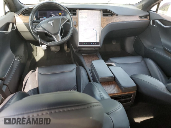 2018 Tesla Model S 75D z VIN 5YJSA1E23JF263642, wystawiony jako Copart lot #50647665 z przebiegiem 71 416 mil mil oraz Szkoda całkowita • Salvage title. Historia ofert i sprzedaży dostępna na DreamBid. Obrazek 8.