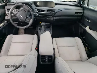 2021 Lexus UX 200 with VIN JTHX3JBH8M2036140, listed as a Copart auction lot 70534384 with 9,872 mi miles and Salvage title. Bid and sale history available at DreamBid. Image 8.