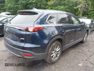 2019 Mazda CX-9 Touring with VIN JM3TCBCY6K0334898, listed as a IAAI auction lot 42467677 with 69,454 mi miles and . Bid and sale history available at DreamBid. Image 4.