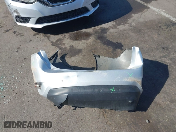 2017 Nissan Sentra S z VIN 3N1AB7AP9HY277592, wystawiony jako IAAI lot #42287903 z przebiegiem 186 876 mil mil oraz . Historia ofert i sprzedaży dostępna na DreamBid. Obrazek 12.