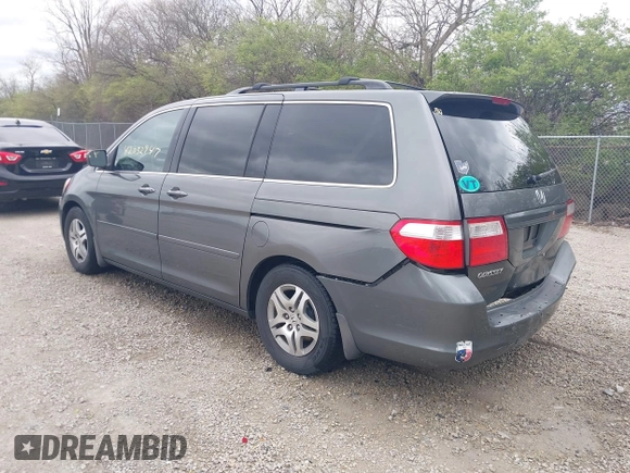 2007 Honda Odyssey EX-L with VIN 5FNRL38767B406636, listed as a IAAI auction lot 42032947 with 228,139 mi miles and . Bid and sale history available at carsss.com. Image 3.