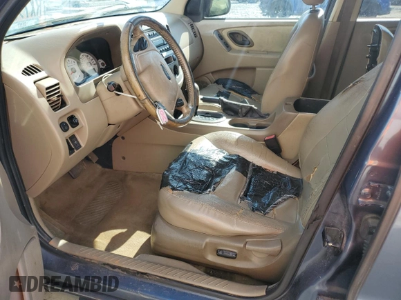 2006 Ford Escape XLT с VIN 1FMCU03176KA57097, выставлен на аукционе Copart как лот 52607965 с пробегом 255 230 миль миль и Списание • Salvage title. История ставок и продаж доступна на DreamBid. Изображение 7.