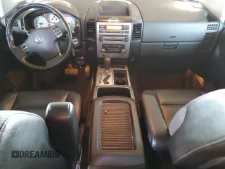 2011 Nissan Titan Pro-4X z VIN 1N6BA0EC9BN304469, wystawiony jako Copart lot #52982815 z przebiegiem 108 829 mil mil oraz Szkoda całkowita • Salvage title. Historia ofert i sprzedaży dostępna na DreamBid. Obrazek 8.