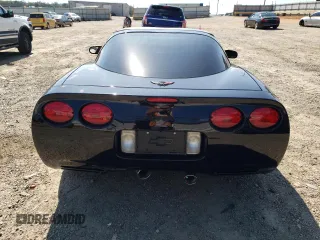 2002 Chevrolet Corvette with VIN 1G1YY22G425127253, listed as a Copart auction lot 74689014 with 68,080 mi miles and Salvage Title. Bid and sale history available at carsss.com. Image 6.