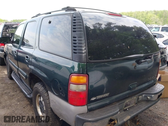 2001 Chevrolet Tahoe LT with VIN 1GNEK13T51R116634, listed as a IAAI auction lot 42106345 with 264,916 mi miles. Bid and sale history available at carsss.com. Image 3.