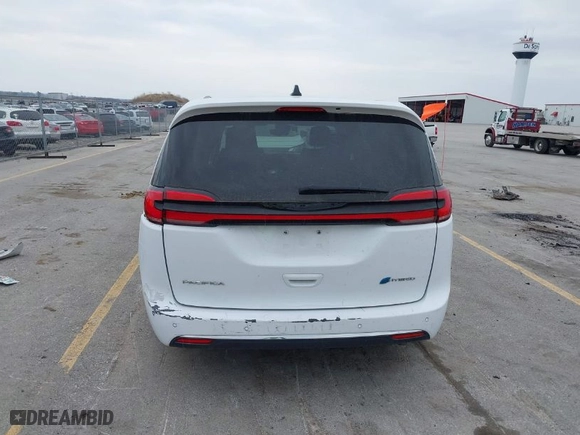 2023 Chrysler Pacifica Hybrid Touring L with VIN 2C4RC1L74PR540870, listed as a IAAI auction lot 42056528 with 46,940 mi miles. Bid and sale history available at carsss.com. Image 17.