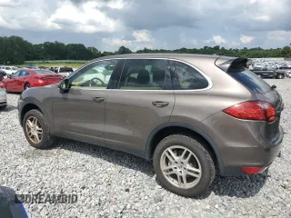 2014 Porsche Cayenne S Hybrid with VIN WP1AE2A29ELA51406, listed as a Copart auction lot 61163965 with 99,047 mi miles and Clean title. Bid and sale history available at DreamBid. Image 2.