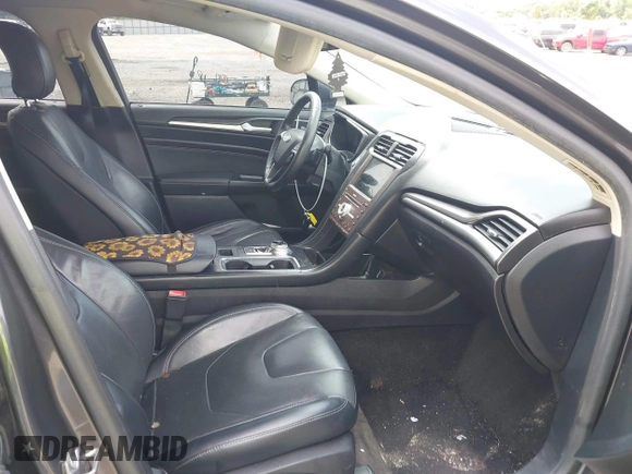 2017 Ford Fusion Titanium with VIN 3FA6P0K98HR363360, listed as a IAAI auction lot 42461432 with 182,807 mi miles and . Bid and sale history available at DreamBid. Image 5.