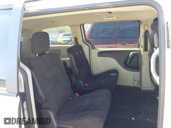 2013 Dodge Grand Caravan SXT with VIN 2C4RDGCG2DR522136, listed as a IAAI auction lot 42023561 with 176,635 mi miles and . Bid and sale history available at DreamBid. Image 8.