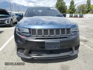 2020 Jeep Grand Cherokee Trackhawk z VIN 1C4RJFN94LC314087, wystawiony jako Copart lot #51484835 z przebiegiem 38 306 mil mil oraz Szkoda całkowita • Salvage title. Historia ofert i sprzedaży dostępna na DreamBid. Obrazek 5.