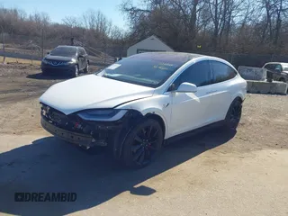 2018 Tesla Model X 75D with VIN 5YJXCAE45JF103828, listed as a IAAI auction lot 41698708 with 118,699 mi miles and . Bid and sale history available at carsss.com. Image 19.