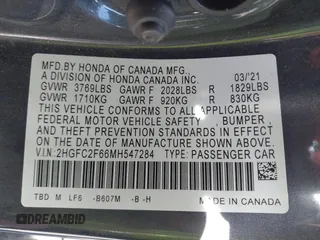 2021 Honda Civic Sedan LX with VIN 2HGFC2F66MH547284, listed as a IAAI auction lot 41811993 with 47,848 mi miles. Bid and sale history available at carsss.com. Image 9.