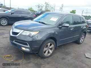 2013 Acura MDX with VIN 2HNYD2H25DH516861, listed as a IAAI auction lot 41986459 with 203,126 mi miles. Bid and sale history available at carsss.com. Image 2.