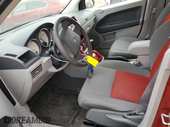 2007 Dodge Caliber SXT z VIN 1B3HB48B07D580803, wystawiony jako Copart lot #76931074 z przebiegiem 146 833 mil mil oraz Szkoda całkowita • Salvage title. Historia ofert i sprzedaży dostępna na DreamBid. Obrazek 7.
