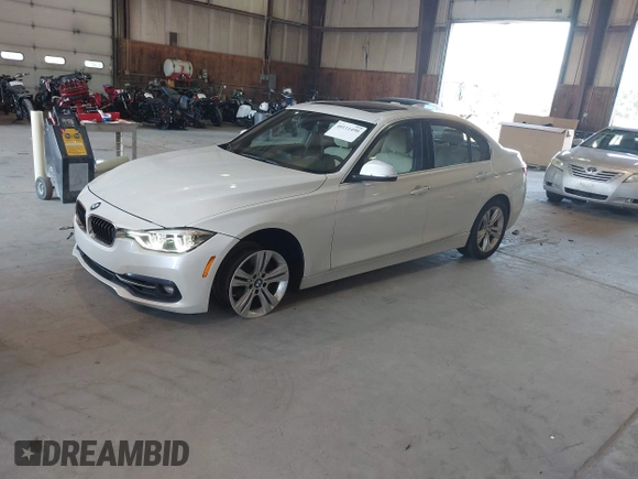 2017 BMW 3 Series 330i with VIN WBA8B9C57HK675592, listed as a IAAI auction lot 40111490 with 142,203 mi miles and . Bid and sale history available at DreamBid. Image 2.
