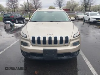 2014 Jeep Cherokee Latitude with VIN 1C4PJLCB8EW191911, listed as a IAAI auction lot 41956728 with 123,643 mi miles. Bid and sale history available at carsss.com. Image 12.