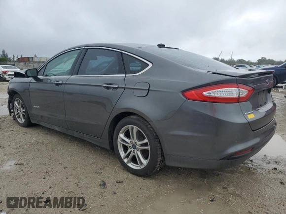 2016 Ford Fusion Titanium Hybrid with VIN 3FA6P0RU1GR204009, listed as a Copart auction lot 89110025 with 114,578 mi miles and Salvage Title. Bid and sale history available at carsss.com. Image 2.