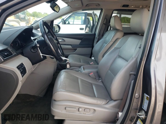 2014 Honda Odyssey EX-L with VIN 5FNRL5H60EB125478, listed as a Copart auction lot 59218355 with 165,928 mi miles and Salvage title. Bid and sale history available at DreamBid. Image 7.