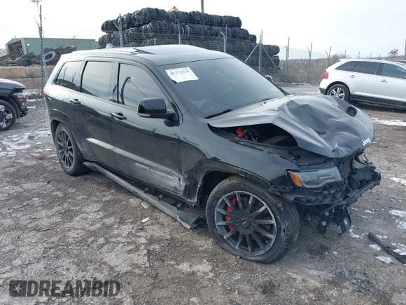 2017 Jeep Grand Cherokee SRT with VIN 1C4RJFDJ7HC641926, listed as a IAAI auction lot 41272215 with 117,667 mi miles. Bid and sale history available at carsss.com. Image 1.