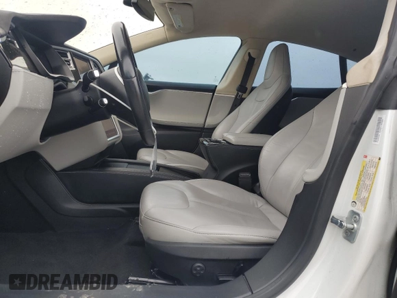 2014 Tesla Model S 60 с VIN 5YJSA1H19EFP52457, выставлен на аукционе Copart как лот 59589905 с пробегом 167 662 миль миль и Списание • Salvage title. История ставок и продаж доступна на DreamBid. Изображение 7.