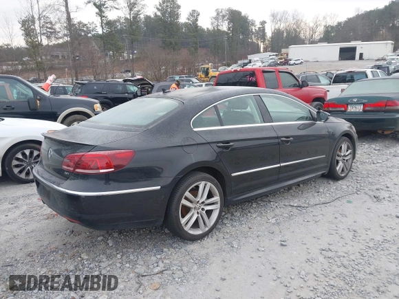 2014 Volkswagen CC Lux with VIN WVWRP7AN3EE537770, listed as a IAAI auction lot 41385247 with 135,069 mi miles. Bid and sale history available at carsss.com. Image 4.