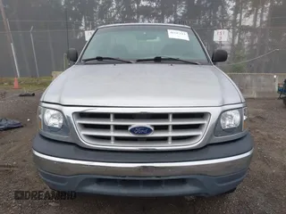 1999 Ford F-150 with VIN 2FTZF1828XCA85643, listed as a IAAI auction lot 41347113 with 173,813 mi miles and . Bid and sale history available at DreamBid. Image 12.