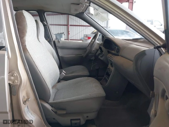 1997 Ford Aspire with VIN KNJLT06H0V6215753, listed as a IAAI auction lot 41504661 with NaN miles. Bid and sale history available at carsss.com. Image 5.
