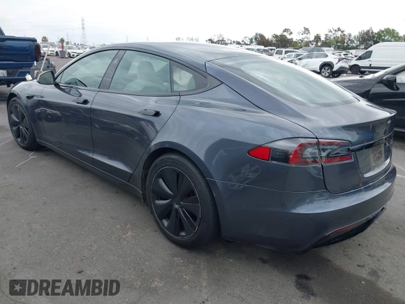 2021 Tesla Model S Long Range с VIN 5YJSA1E57MF441387, выставлен на аукционе IAAI как лот 42034307 с пробегом Не указан миль и . История ставок и продаж доступна на DreamBid. Изображение 3.