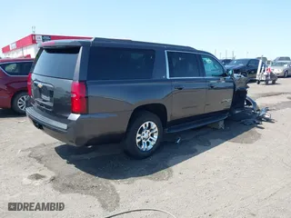 2018 Chevrolet Suburban LT with VIN 1GNSCHKCXJR128787, listed as a IAAI auction lot 41909965 with 123,020 mi miles. Bid and sale history available at carsss.com. Image 4.