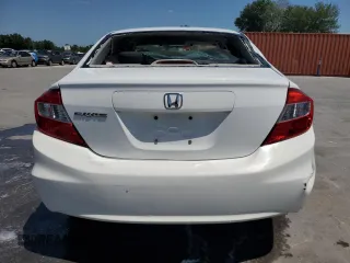 2012 Honda Civic LX с VIN 19XFB2F54CE110189, выставлен на аукционе Copart как лот 52914705 с пробегом Не указан миль и Списание • Salvage title. История ставок и продаж доступна на DreamBid. Изображение 6.