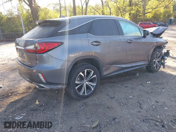 2016 Lexus RX 350 with VIN 2T2ZZMCA3GC004189, listed as a IAAI auction lot 41987707 with 95,562 mi miles and . Bid and sale history available at DreamBid. Image 4.